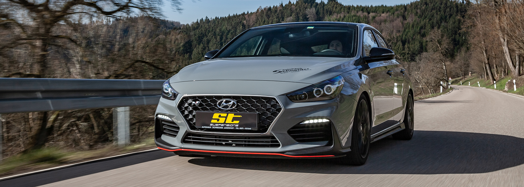 Hyundai i30 N Fastback lowered with ST height-adjustable springs on countryroad.